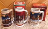 2003-2005 Budweiser Holiday beer steins with original boxes. Largest is 7