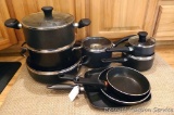 Nice set of non-stick cookware is in overall good condition.