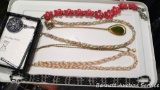 Women's necklaces, one is magnetic.