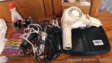 Healthometer bathroom scale; blow dryer; several curling irons; hair clips and nail polish.