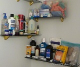 Bathroom items including rib belt and other bandages, unopened mouth wash, partials of others as