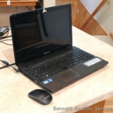 Gateway NV57H/NV55S laptop computer with new wireless mouse and carry case. Clean and ready to go.