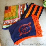 Three handmade afghans. Multi-colored measures approx. 4' x 4'.