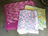 Three handmade afghans are all in good condition. Pink afghan measures 6' x 6'.