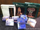 Five boxes of twinkling curtain light sets; three boxes of twinkling 4'x6' net sets; 4' spiral rope