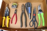 Wiss straight cut aviation shears; Stanley 12' PowerLock tape; Rapala fishing pliers; lineman's