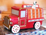 2000 ceramic Budweiser coin bank with original box and some contents. Bank is 8