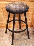 Very sturdy swiveling stool in great condition has an all-steel frame and stands approx. 29