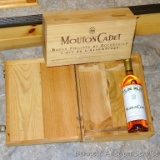 No shipping. One bottle of 2001 Mounton Cadet Bordeaux; plus two wooden wine boxes. All unopened,