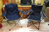 Two folding yard chairs, one with a bag. Both are in good condition.