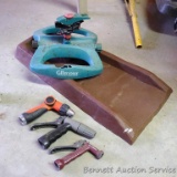 Downspout chute, three hose nozzles and a sprinkler