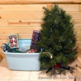 Tote filled with Christmas decorations, mostly pink tones; plus a faux 3-1/2' tall Christmas tree.