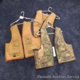 Three adult life vests, S/M, XXL and XXXL.