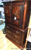 Sturdy wardrobe style cabinet has three drawers has plenty of space for storage. Measures 40