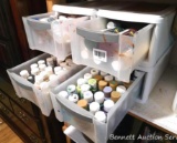 Four Sterilite organizer drawers full of craft paint. All stored inside.