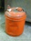 Five gallon gas can with partial gas in. 11