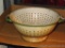 Nice enameled colander is cream and green, measures 10-1/2