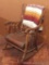 Old oak rocking chair is of an appealing style and is fairly sturdy. Good for the porch or for