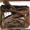 Assortment of antique grab and logging hooks. 9