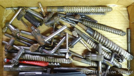 Assortment of drill bits, concrete, metal and several drill chuck keys.