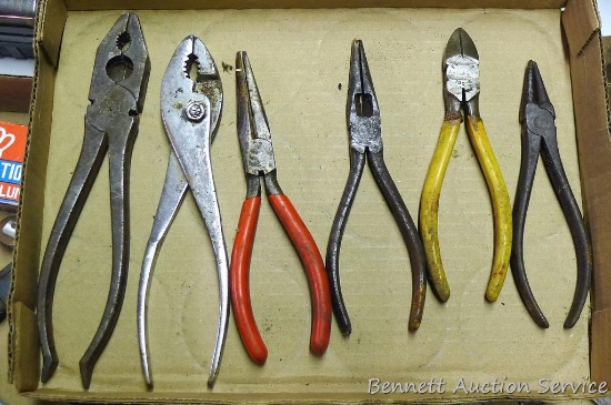 Assortment of pliers includes needle nose, side cutters, regular and more.