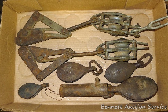 Metal pulleys includes singles and doubles. Largest is 14" x 2".