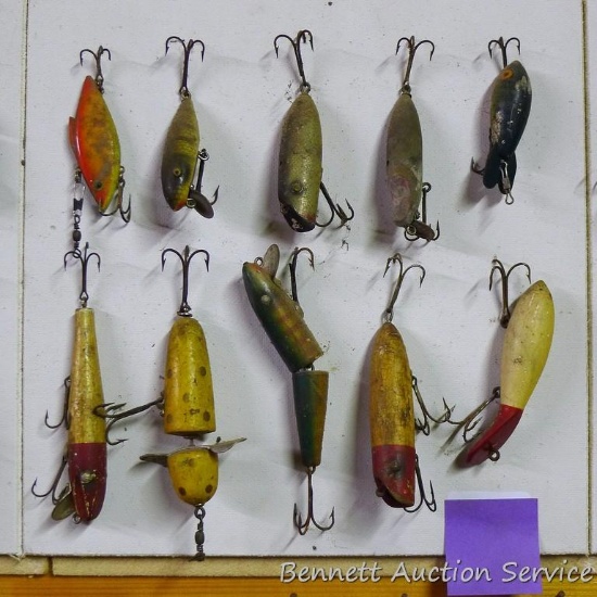 Old fishing lures, some with tack eyes. Longest has a 4-1/2" body.