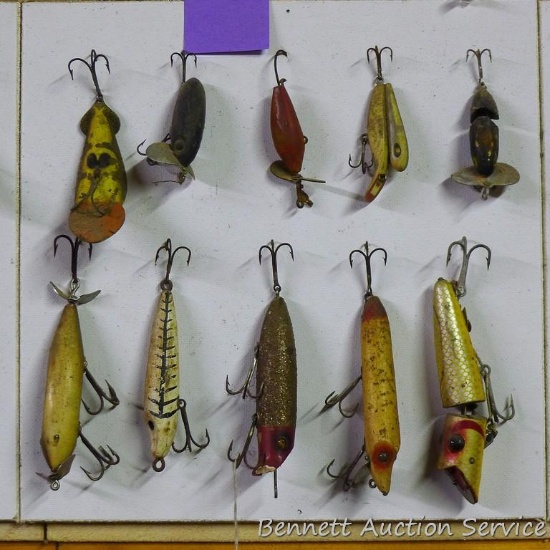 Old fishing lures, some with glass eyes. Longest body is 5".