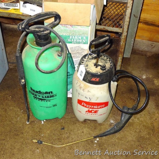 Two garden sprayers, largest is 24" x 7".
