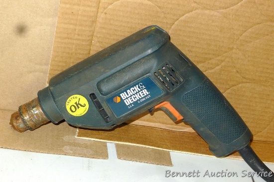 Black & Decker 3/5 amp 3/8 reversible drill. Works.