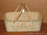 Sturdy woven basket with handles. 28