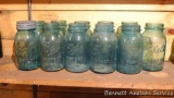 Eleven blue Ball quart jars.