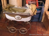 Vintage baby doll buggy is as sturdy as any of them were. Measures approx. 27