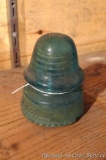 Petticoat green glass insulator by H.G. Co. patent May 2, 1893. Stands about 4