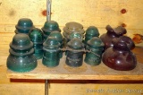 Brown ceramic, plus blue and clear glass insulators. Brown ceramic pieces are marked S B T.