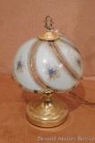 Decorative lamp with floral shade . Stands 15