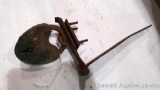 Antique skeleton lock mounted on old barn latch. 2.5