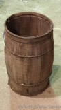 Wooden nail keg is nearly 1-1/2' tall. Good condition except for bottom band, which has rusted