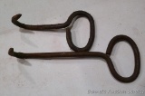 Two hand forged hay bale hooks, longest is just over a foot.