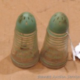 Antique glass salt and pepper shakers. 