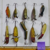 Old fishing lures, some with tack eyes. Longest has a 4-1/2