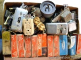 Electrical plugs, switches, electric eye, and more. Some are new in package.
