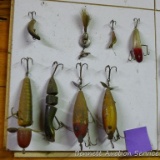 Old fishing lures, some with glass eyes. Longest body is 5-1/2