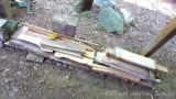 Pile of wood pieces including hardwood, dowels, and blocking. Blacking is 28