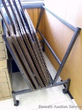 Sturdy rolling print rack is in good condition and measures 38