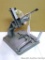 Metal drill press. Put your own drill in it. 10
