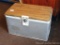 Aluminum sided cooler with faux wood grain top measures 22