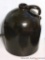Brown glazed stoneware jug looks as though it may be 2 gallon. Wide mouthed jug stands approx.