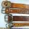 Four men's leather belts with eagle and white tail designs. Belts measure 40