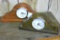 Two handmade mantle-style clocks. One measures 12